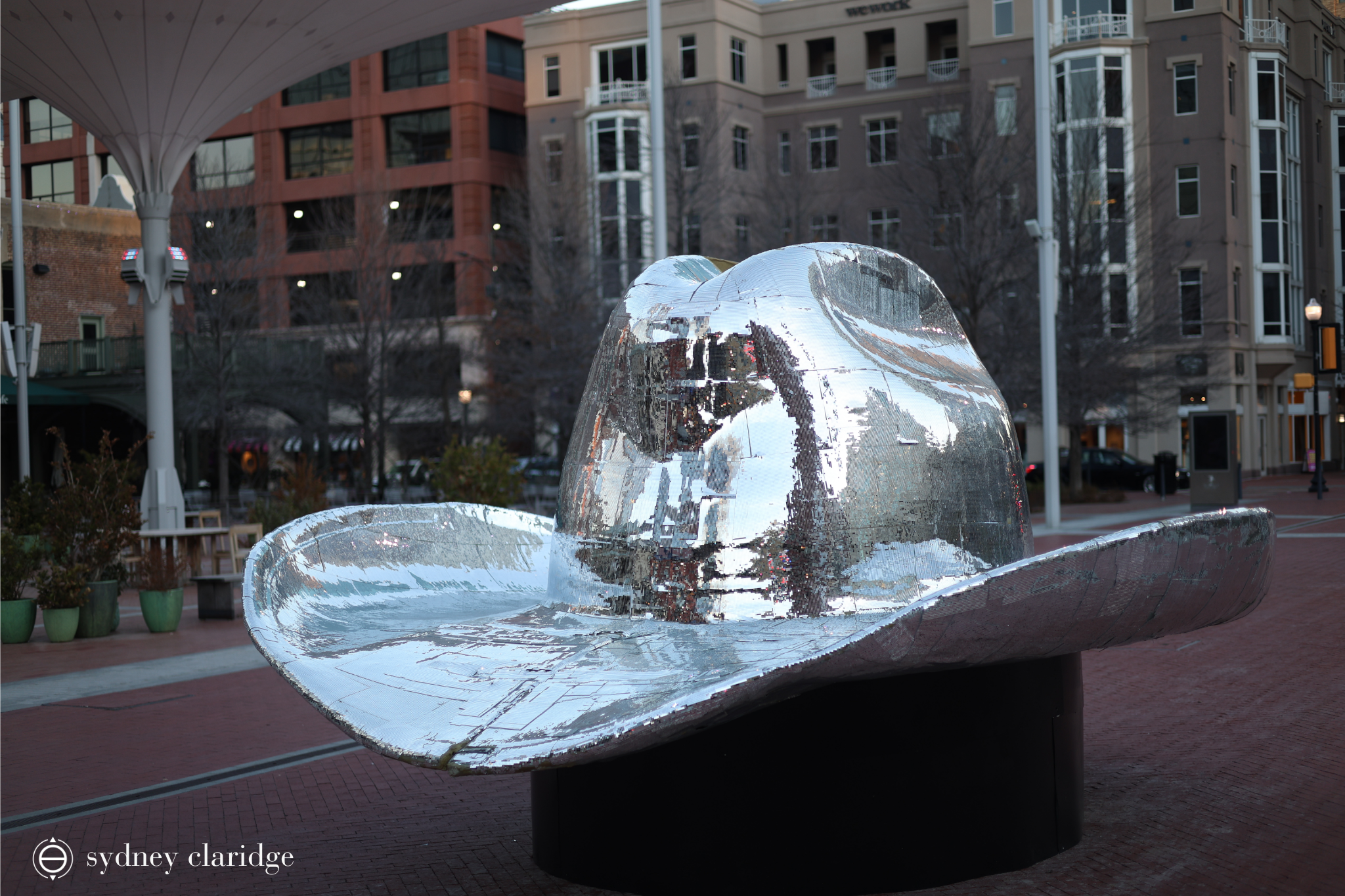 A larger-than-life, sparkling cowboy hat.